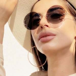 Lunettes de soleil rondes vintage de luxe pour femmes 2021, en métal, sans monture, UV400 - Product Image 1