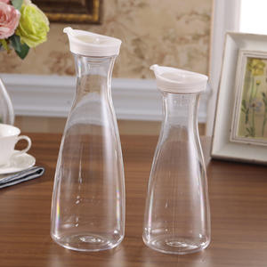 Bouteille <span class=keywords><strong>d</strong></span>'<span class=keywords><strong>eau</strong></span> à jus en plastique 1L <span class=keywords><strong>Carafe</strong></span> transparente sans BPA avec couvercle <span class=keywords><strong>Carafe</strong></span> à boisson en plastique - Product Image 1