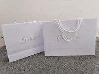 Guangzhou Design Imprimé Shopping Cadeau Emballage Sac En Papier Avec Votre Propre Logo