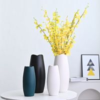 Vase de table en céramique moderne en gros avec ensemble de fleurs artificielles pour la décoration intérieure