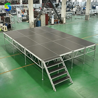 Plateforme de scène en aluminium imperméable à plusieurs niveaux avec structure en treillis pour concerts en plein air, spectacles, festivals et événements