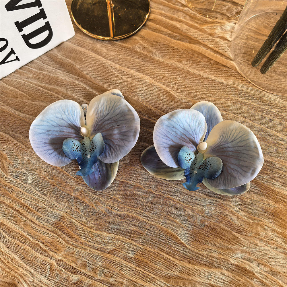Blue phalaenopsis flower shoe clip pair