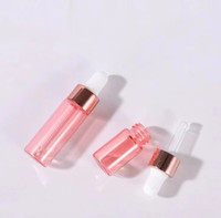 Bouteille de compte-gouttes de sérum Rose à huile ronde en verre 1ml 2ml 3ml 5ml bouteille de compte-gouttes oculaire en or Rose bouteille de compte-gouttes Rose pour les cosmétiques