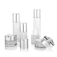 35ml 100ml 120ml ensemble de bouteilles en verre de luxe cylindriques vide 30g couvercle de pot poli sérigraphie pompe pulvérisateur emballage de crème pour le visage