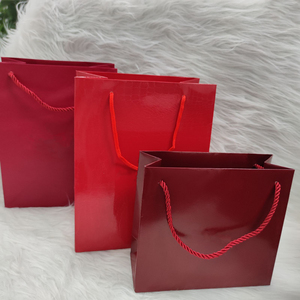 Red Glossy Paper Gift Bags Rope Handle Shopping <b>Packaging</b> Bags Custom Logo Retail Boutique Use Jewelry <b>Packaging</b> Bags with Logo - Product Image 2