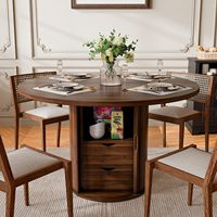 Table à manger ronde en noyer de 47 pouces avec base de rangement intégrée et 2 tiroirs, design à lattes de bois pour cuisine et appartement.