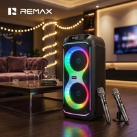 Enceinte karaoké Bluetooth Remax avec 2 microphones sans fil, éclairage RGB, système audio portable pour les fêtes