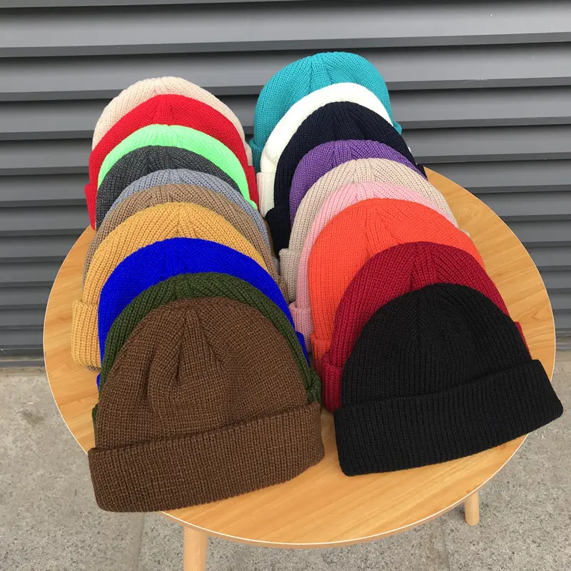 Yüksek kalite kış düz boyalı özel balıkçı şapkası 100% akrilik sıcak örme bere özel Logo