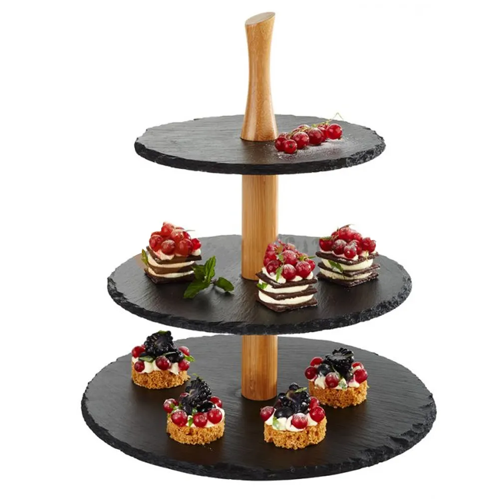 מזנין שלוש קומות של אבן צפחה ומסיבת שוקולד עץ המציע סיר משעשע כף מעמד קינוח עוגת פירות ים