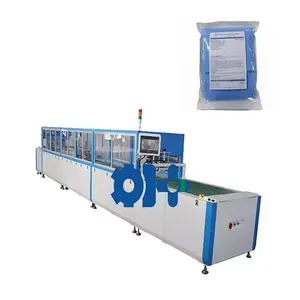 surgical suits folding and packing machine /doctor suit folding machine/ disinfect doctor gowns packing machine