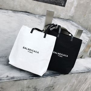 กระเป๋าผ้าแคนวาสทำจากผ้าฝ้ายแบบนำกลับมาใช้ใหม่โลโก้ที่กำหนดเองได้หรูหรา - Product Image 1