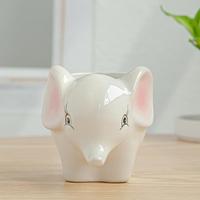 Jolie jardinière en forme d'animal inversé de style dessin animé, pot de fleurs vert pour la décoration de la maison et du jardin