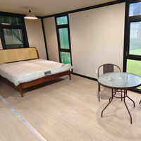 Maison conteneur duplex à deux étages, maison modulaire, métal ondulé noir, éclairage LED, villa préfabriquée de luxe, vente en gros OEM