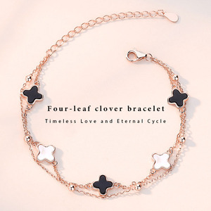 <span class=keywords><strong>Bracciale</strong></span> Trendy Placcato Oro Rosa in Ottone a Doppio Strato <span class=keywords><strong>con</strong></span> Ciondolo a Quadrifoglio e Intarsio in Conchiglia, Regalo Delicato per Donne - Product Image 1