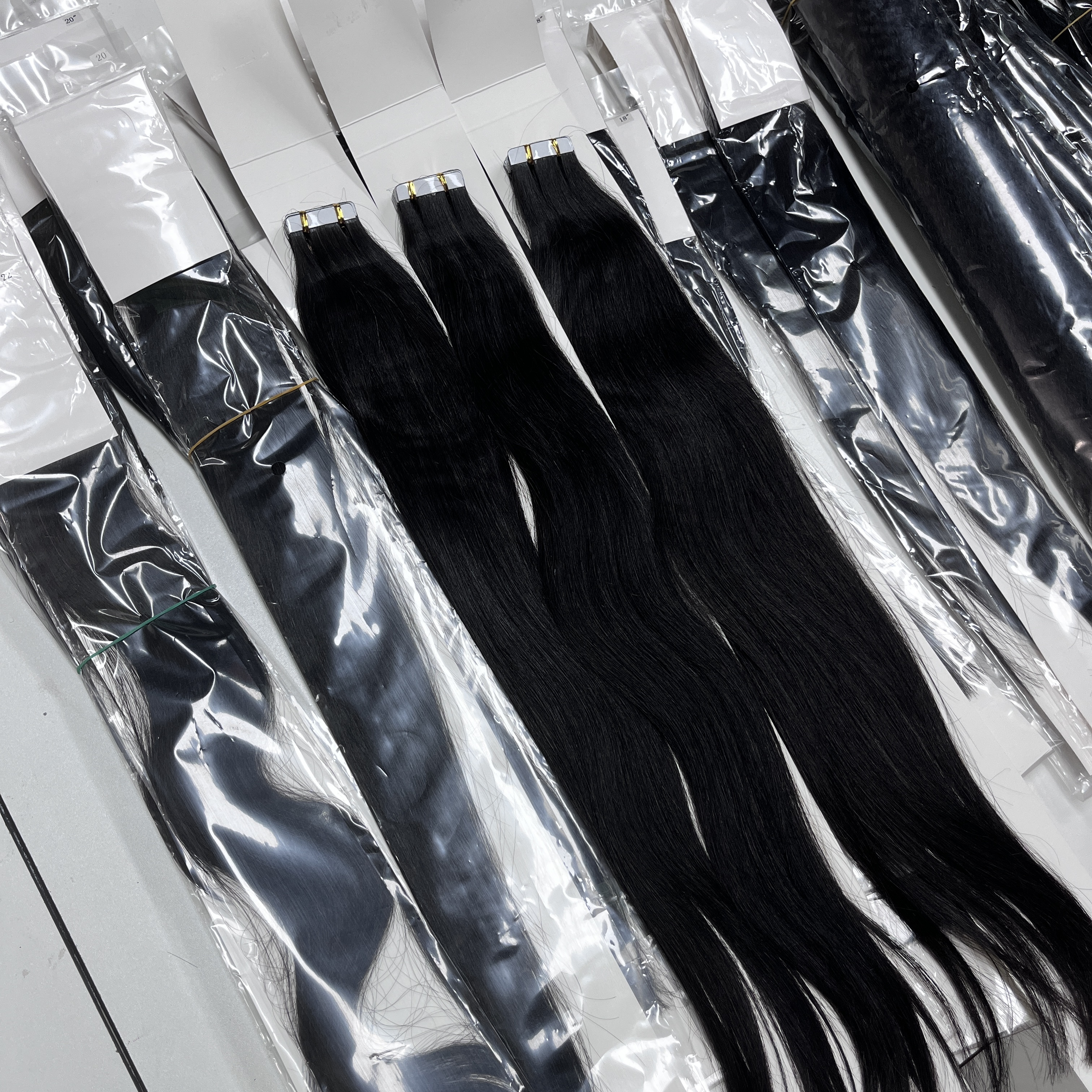 1 paquete de extensiones adhesivas rectas de 50 gramos