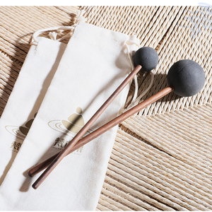 Baqueta de cobre con punta redonda y revestimiento de silicona, adecuada para actuaciones musicales, yoga y meditación. - Product Image 1