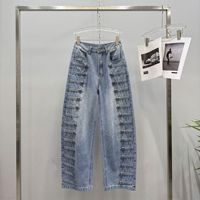 Le nouveau style d'automne américain : jeans à boutons côtelés en métal vieilli, coupe ample et courbée, pantalons à jambes larges et pantalons longs.