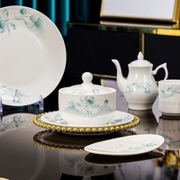 Vaisselle d'hôtel haut de gamme en porcelaine osseuse de Jingdezhen, ensemble de bols et d'assiettes à décor sous glaçure, style chinois moderne pour salles privées de club