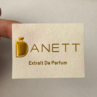 Autocollants personnalisés avec logo, finition en feuille métallique et gaufrage