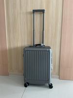 Valise multifonctionnelle unisexe en PC de 20 pouces, design simple et moderne, avec serrure TSA et roulettes à 360 degrés