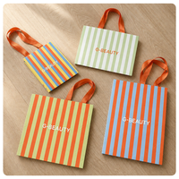 Sacs de courses premium enduits avec poignées, logo personnalisé, sacs rayés colorés imprimés pour cadeaux, vente au détail, emballage en gros