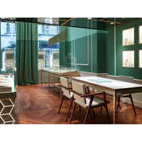 Vitrine murale à LED rétroéclairée avec motif géométrique moderne en forme de diamant et dessus en verre pour boutique