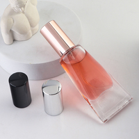 Nouveau design de tube cosmétique en verre en forme de dentifrice, flacon d'huile essentielle de 10 ml avec bille roulante