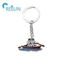 Fabrication de porte-clés de chaloupe en émail Porte-clés de sport de bateau à rames en métal Porte-clés d'équipage d'aviron de pagaie personnalisé souvenir