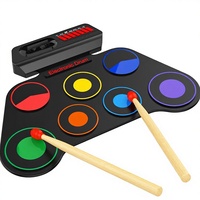 Batterie électronique portable AiJoy pour enfants - 7 pads, haut-parleur intégré, conception enroulable, mode casque, morceaux de démonstration - Cadeau de Noël pour