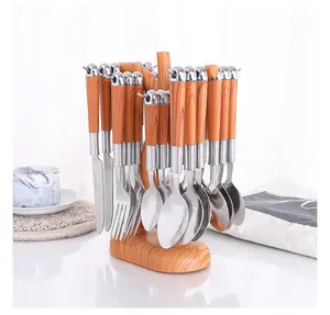 Hot wooden handle stainless steel tableware set knife, fork and spoon portable 24-piece cutlery set with rack