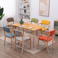 Chaises d'accoudoir de ferme modernes luxueuses chaises de salle à manger empilables en bois de tissu de Style nordique pour la vie de chambre à coucher de meubles de maison
