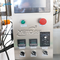 Ligne de production entièrement automatique pour le remplissage, le congélation, le pressage, le capsulage et l'étiquetage de bâtons de déodorant et de bougies parfumées d'ambiance