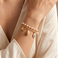 Bracelets tendance en acier inoxydable plaqué or 18 carats, hypoallergéniques, avec breloques coquillages, dauphins, conques et cœurs, bijoux de plage