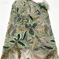 Tissu en dentelle brodée de sequins