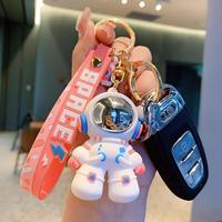Vente en gros de porte-clés de voiture en PVC 3D, accessoires de porte-clés de personnage Kawaii, porte-clés de voiture mignon de dessin animé, porte-clés d'astronaute