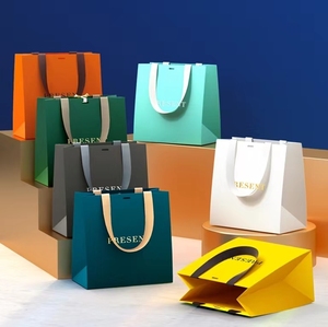 Wholesale Fancy Paper Tote Bag Shopper Paper Bag Customized Kraft Paper Bag With Ribbon Handle