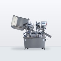 Machine automatique de remplissage et de scellage de tubes souples préformés pour crème cosmétique, pommade, dentifrice