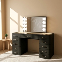 Coiffeuse et commode de luxe moderne en panneaux de bois, finition noire brillante, quincaillerie dorée, éclairage LED, rangement, miroir amovible pour chambre à coucher