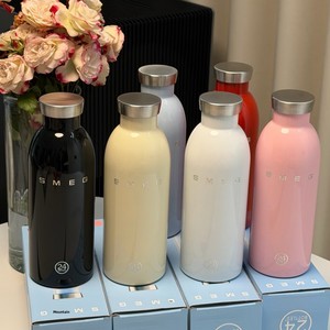 Bouteille isotherme double usage <span class=keywords><strong>SMEG</strong></span> 500 ml couleur crème, modèle collaboration 24e anniversaire, en acier inoxydable 304 - Product Image 1