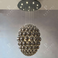 Lustre d'escalier moderne chromé et doré de luxe en forme de boule de verre adapté à la décoration de la maison