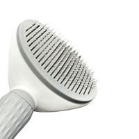 Outil de lissage de brosse de toilettage pour chiens et chats autonettoyant pour l'épilation des animaux de compagnie de style manuel