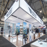 Stand d'exposition modulaire 30x30 en îlot avec affichage LED SEG et salle de réunion pour l'US Aircraft Expo Palo Alto 2027
