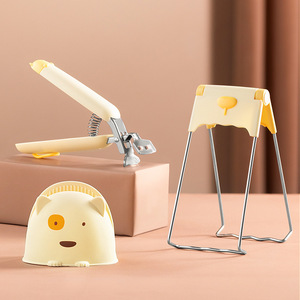 Pince à bol anti-brûlure Xinzao en plastique réutilisable, outil de cuisine pour une manipulation sûre des plats - Product Image 1