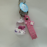 Porte-clés liquide en acrylique en forme de cloche avec figurine flottante Père Noël, poisson, licorne pour la vente en gros, OEM, personnalisation de sacs et de décorations de téléphone