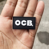 Étiquette en caoutchouc de silicone à coudre avec logo 3D de marque privée en relief pour vêtements Patch de vêtement en PVC souple pour sacs et chaussures