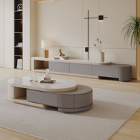 Table basse rétractable italienne de luxe en dalle de pierre de style crème et meuble TV intégré salon minimaliste moderne