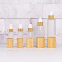 Flacon de lotion en verre dépoli de luxe, vide, à épaule plate, avec pompe pulvérisatrice en bambou, disponible en 30ml, 50ml, 60ml, 100ml, 120ml, 1oz, 2oz, 4oz