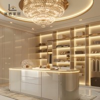 Dressing moderne de luxe avec îlot central et coiffeuse, vitrines en verre pour maisons haut de gamme à Sydney, Australie