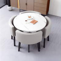 Table à manger ronde moderne de type plaque avec plateau en dalle de roche et pieds en bois, 4 places, design en pierre pour la maison et la villa