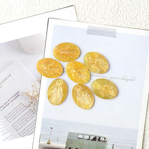 Großhandel natürliche gelbe Schmucksc halen Hochwertige geschnitzte Perlmutt anpassbare Edelsteine im Oval schliff - Product Image 4